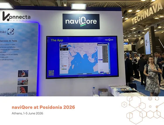 navIQore exhibition stand at Posidonia 2026 with a screen displaying the live fleet map and vessel list